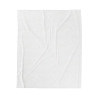A white textured fabric  blanket with a subtle embossed floral pattern, shown flat against a solid white background.