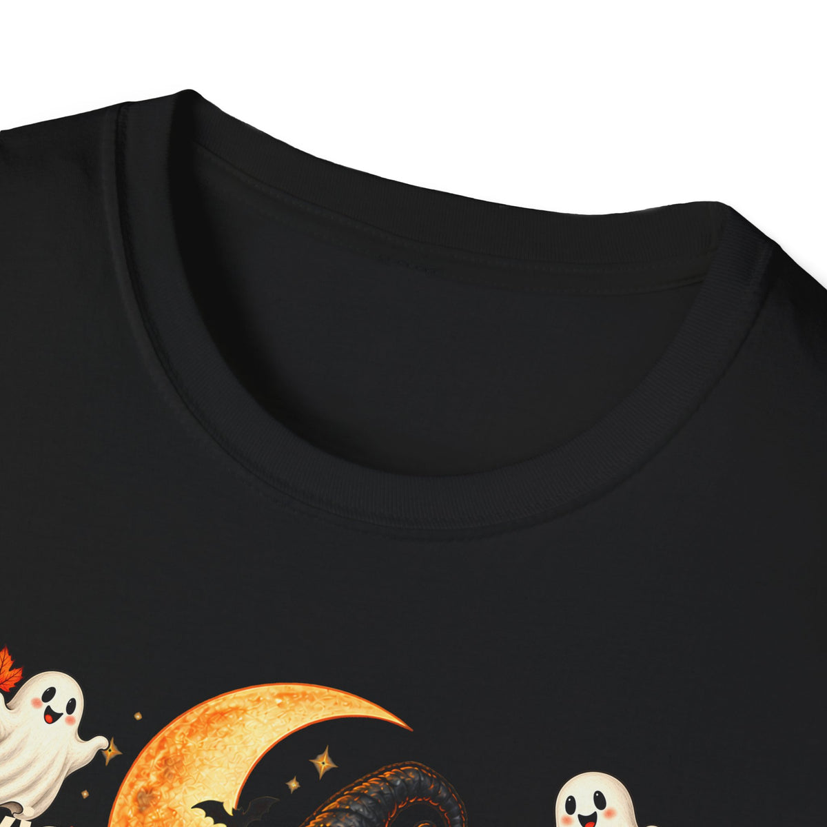 Close-up of a black crewneck t-shirt featuring a Halloween graphic print with cartoon ghosts, a crescent moon, and stars.