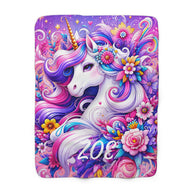 A rectangular blanket featuring a colorful, psychedelic illustration of a white unicorn with a purple and pink mane, surrounded by flowers and swirls, with the number '208' printed near the bottom.