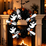 A Halloween wreath hanging in front of a fireplace, decorated with black mesh ribbon, white ghost cutouts, orange spider webs, and rolled white paper banners.