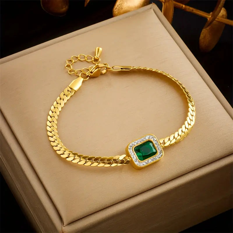 Pulsera de dijes dorados