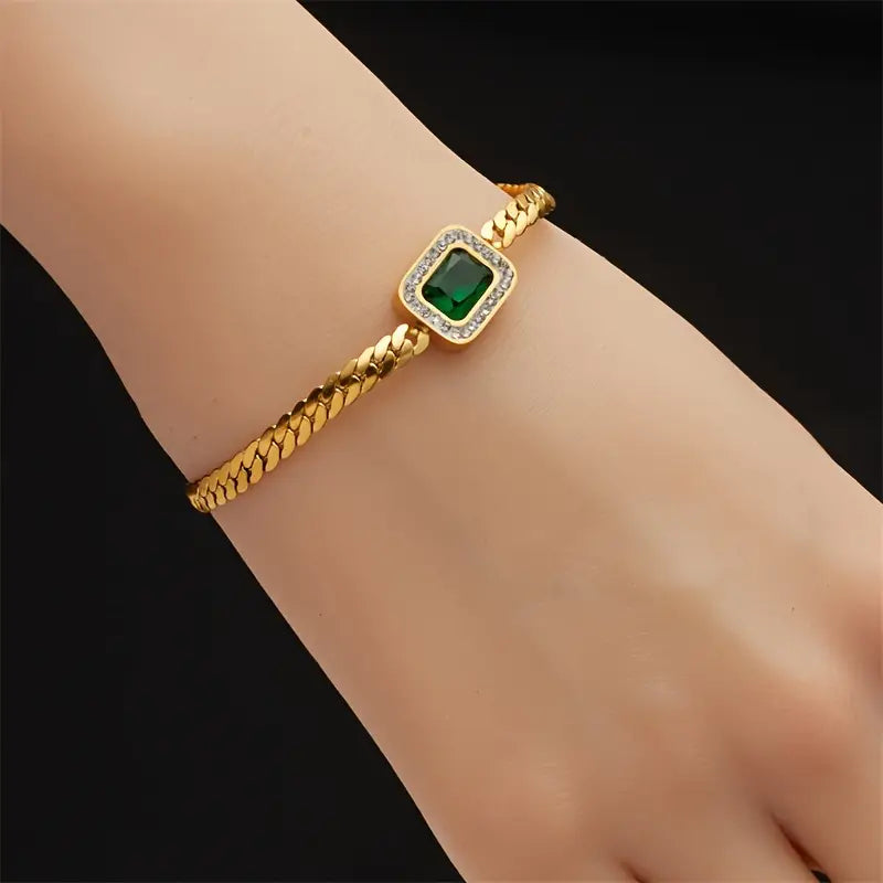 Pulsera de dijes dorados