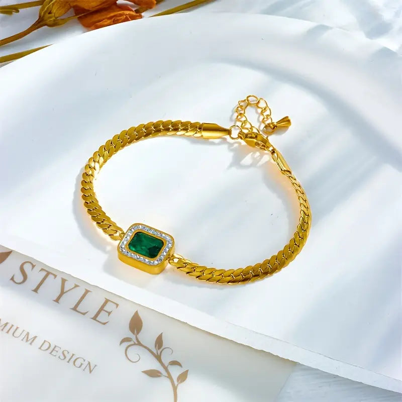 Pulsera de dijes dorados