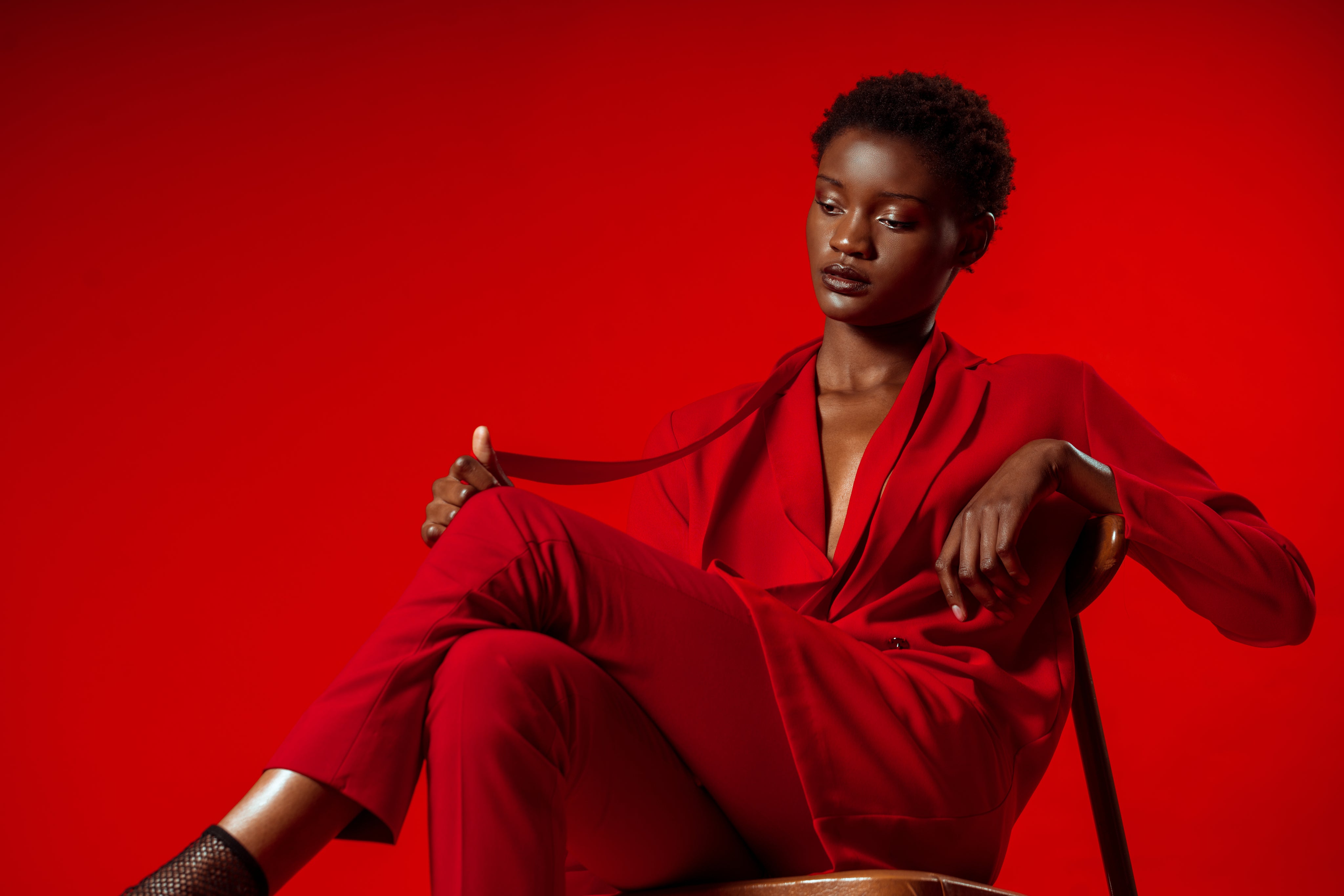 files/model-poses-in-red-pansuit.jpg